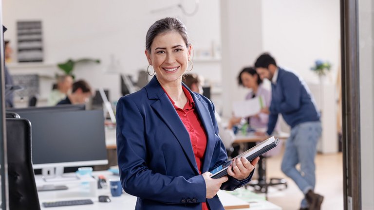 Woman laughing at camera
