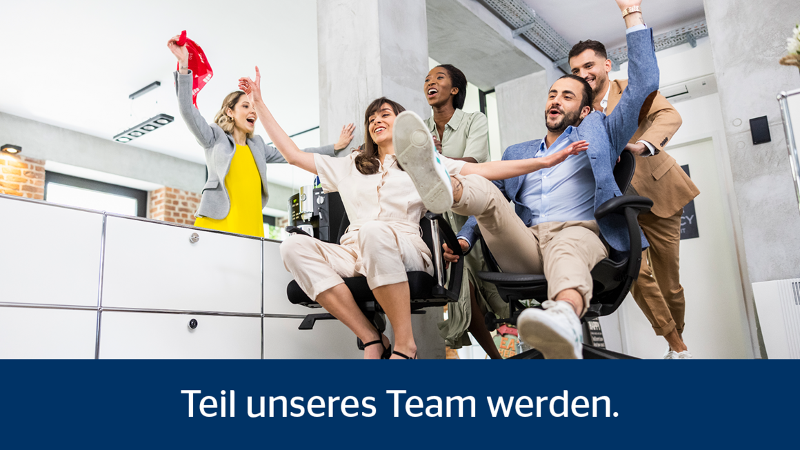 Team hat Spaß im Büro - OVB Karriere Köln Jobs