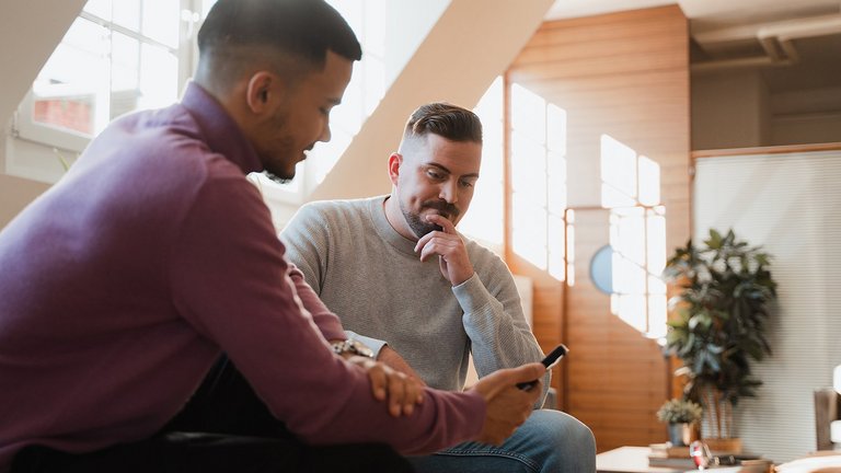 Consultant and customer sitting together