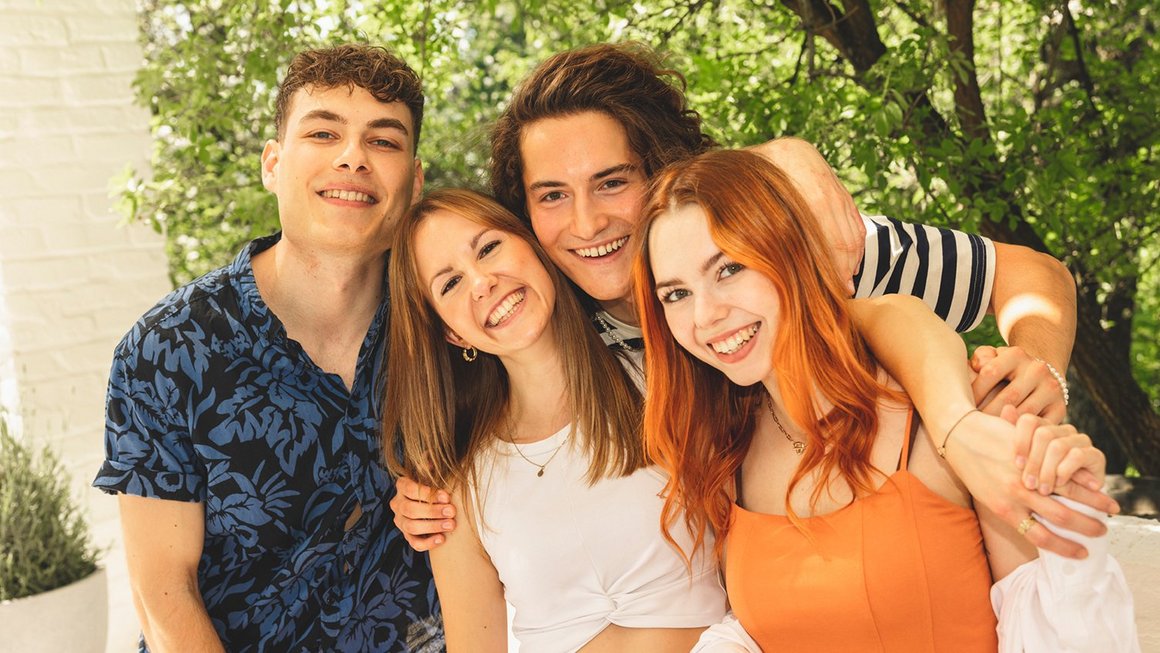 Group of laughing young people – Generation Z in the professional world