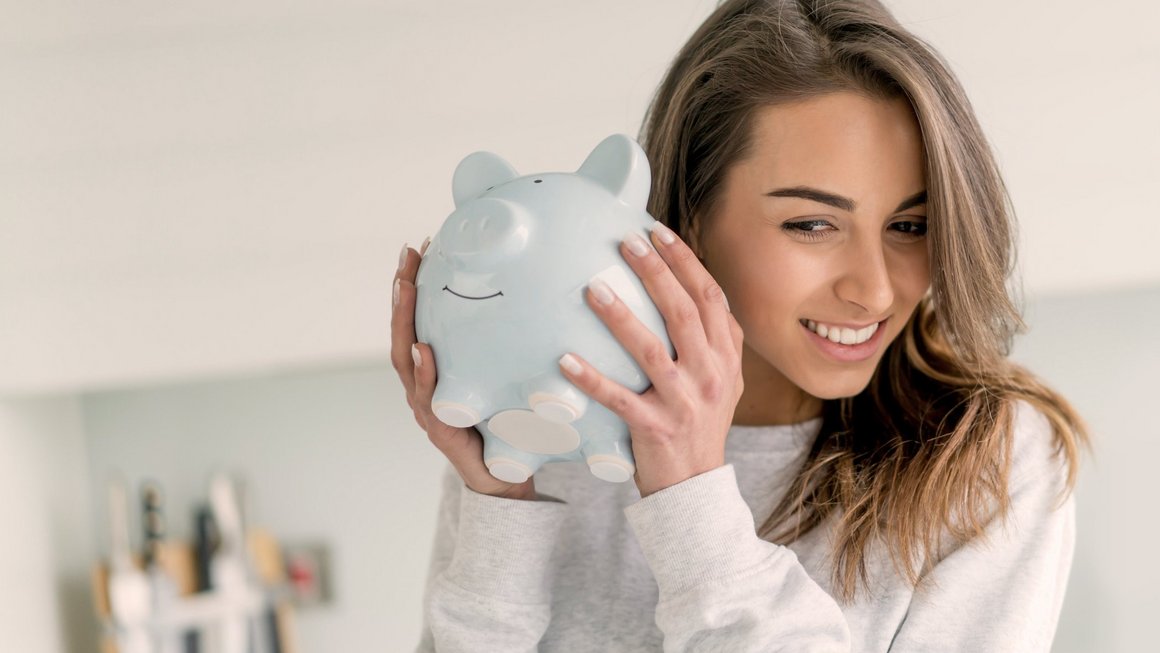 Woman with piggy bank