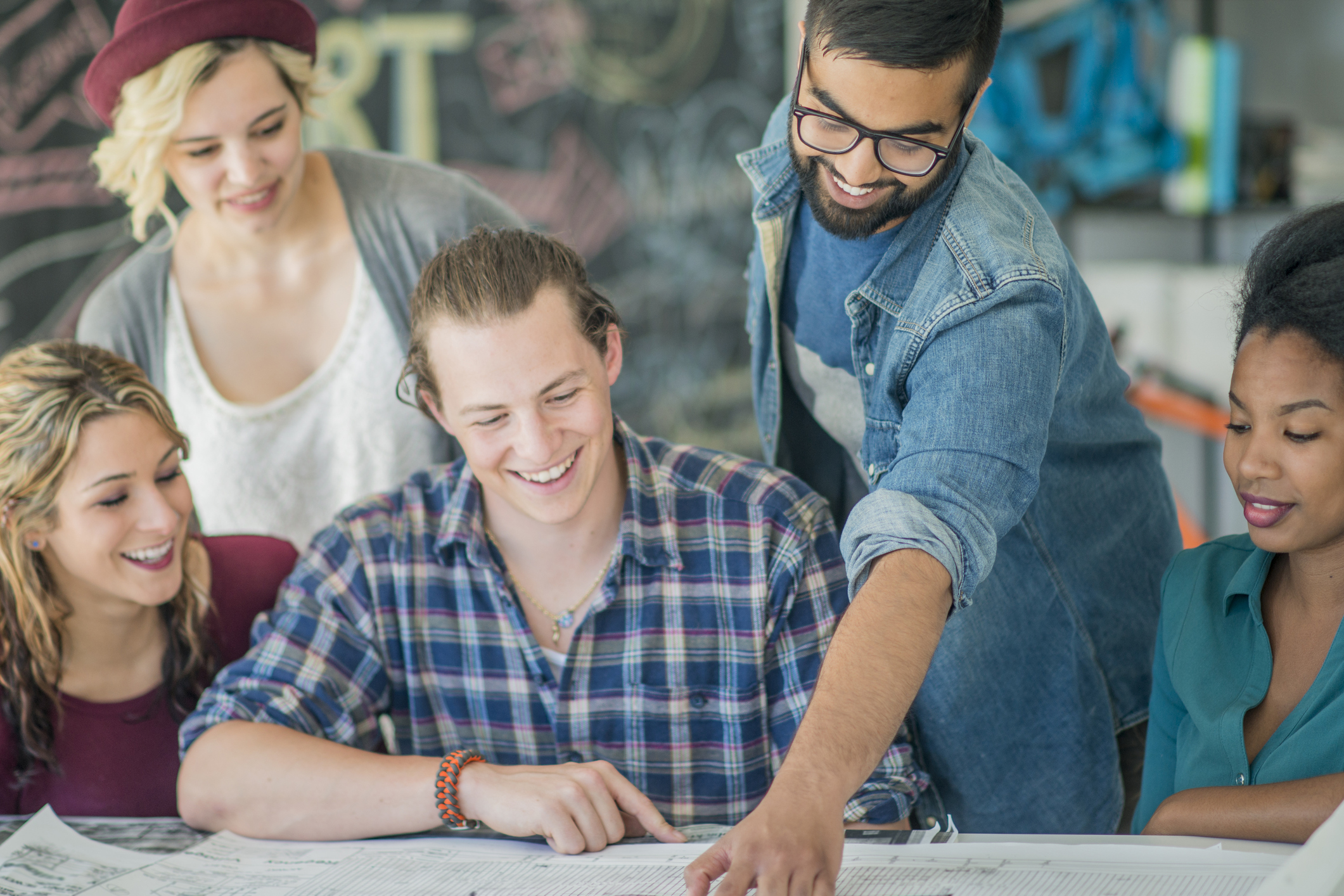 Group of young people working together